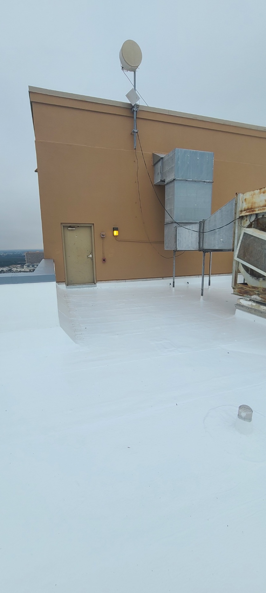 Gulf Coast High-Rise Silicone Coating